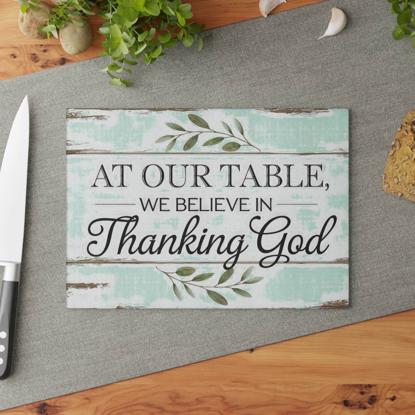 "At Our Table We Believe in Thanking God" Rustic Farmhouse Kitchen Decor - Glass Cutting Board