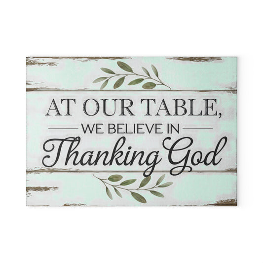 "At Our Table We Believe in Thanking God" Rustic Farmhouse Kitchen Decor - Glass Cutting Board